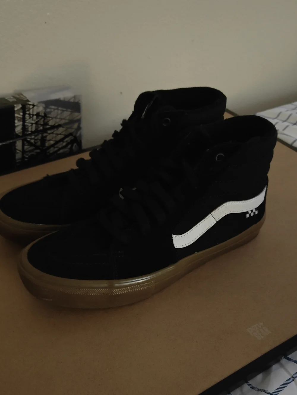 Vans Black High-Top Sneakers with White Side Stripe and Gum Sole